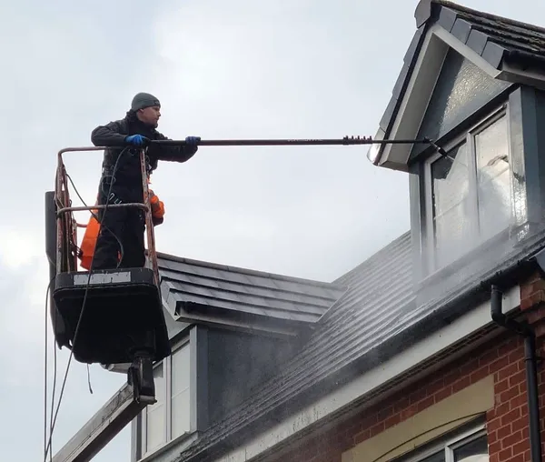 Pressure washing a roof safely