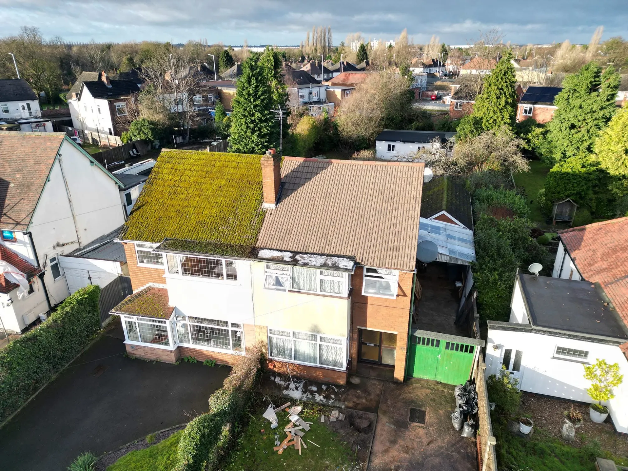 Professional roof cleaning in progress